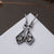 Pendientes Daydreamer con piedra, montura de gota plateada con piedra interior oscura
