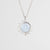 Collar de plata con colgante de sol y relieve de rayos