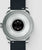 Parte trasera del smartwatch: caja redonda con almohadilla de contacto negra y correa negra