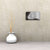 Reloj de pared rectangular de aluminio, gris plateado con estampado y manecillas negras