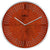 Reloj de pared redondo con marco de metal y esfera con aspecto oxidado, índices de línea y manecillas.