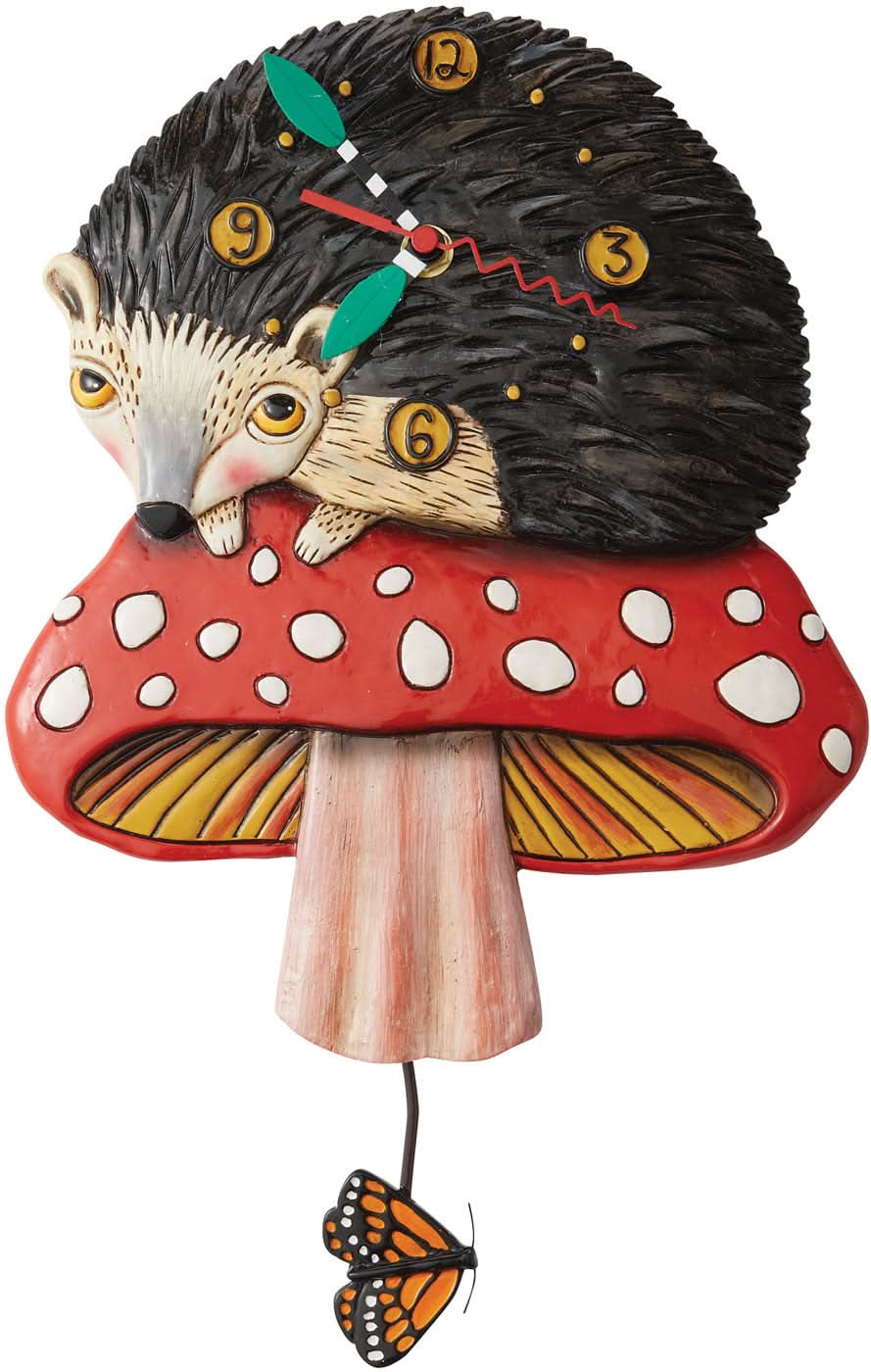 Reloj de pared con diseño de erizo, esfera negra con números de colores, plato rojo para el sombrero