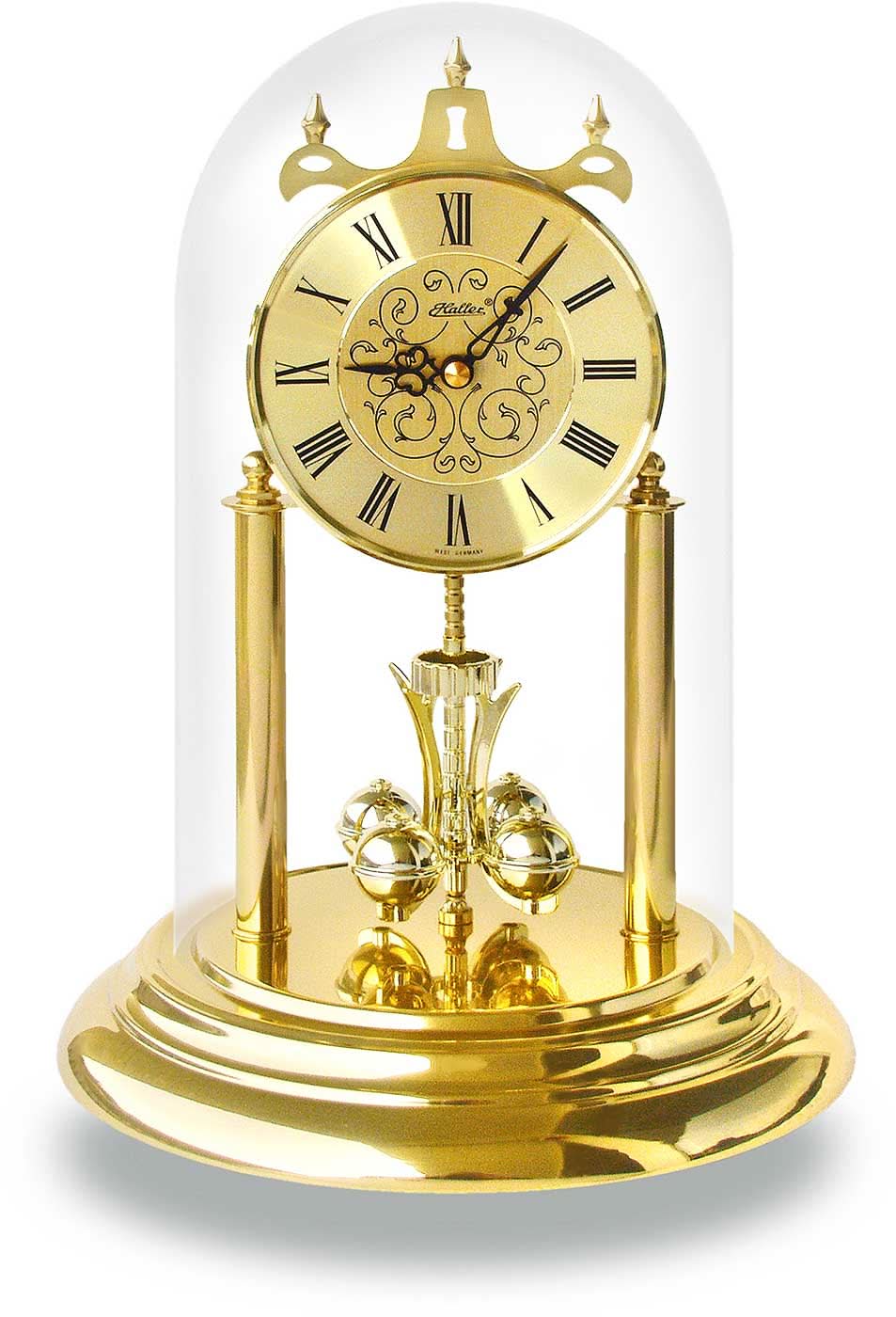 Reloj de mesa con marco redondo dorado, campana de cristal y números romanos