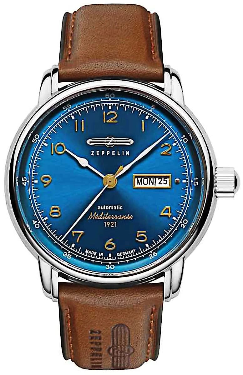 Reloj de hombre con esfera azul, indicador de fecha y correa de cuero marrón, automático