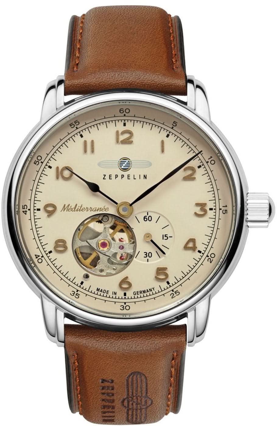 Reloj Zeppelin para hombre con caja plateada, esfera beige y correa de cuero marrón, mecánico visible.