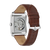 Reloj de pulsera para hombre con movimiento expuesto y correa de cuero marrón, perfil