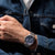 Reloj Promaster para hombre en la muñeca con esfera azul y correa de acero inoxidable