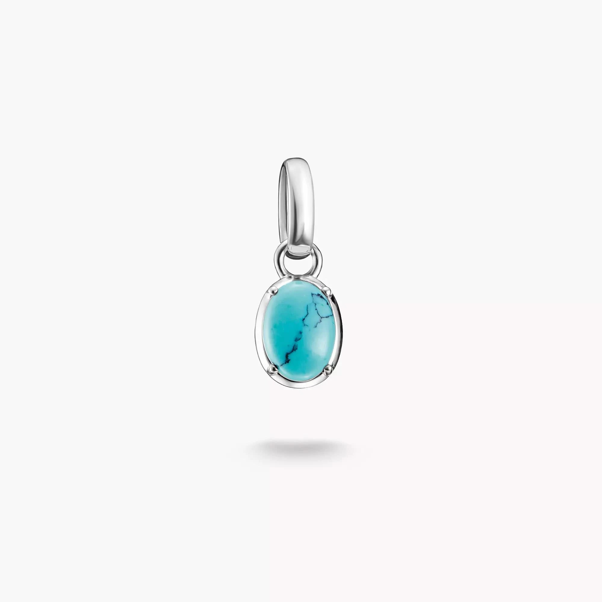 Colgante Charm THOMAS SABO con piedra turquesa ovalada en montura de plata