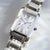 Citizen Reloj de Mujer Detalle: esfera rectangular con números romanos y manecilla azul