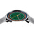 Pulsera de hombre vista desde arriba con esfera verde, manecillas amarillas y brazalete de metal