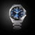 Citizen Serie 8 Reloj para hombre, vista frontal con esfera azul y pulsera ancha de acero inoxidable