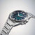 Reloj de hombre con pulsera de acero inoxidable plateado, esfera verde oscuro con índices de línea