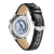 Pulsera de hombre con ventana transparente al movimiento automático y correa de cuero negro.