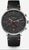 Reloj Hamburg Chrono Edition, negro y plateado, con correa de cuero vintage negra y detalles rojos, visto de frente sobre fondo gris.
