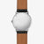 Reverso de un reloj de pulsera para hombre con correa de cuero marrón y grabado en la caja