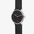 Reloj automático unisex con correa de cuero negra, esfera redonda negra y segundero rojo