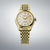 Reloj dorado para hombre con esfera plateada y correa de metal, caja redonda