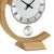 Reloj de mesa AMS con péndulo plateado, esfera redonda y base de madera curvada
