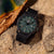Reloj Luminox para hombre con esfera verde, índices luminosos, caja negra y correa de textil