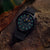 Reloj Luminox para hombre con correa textil negra, caja negra, números verdes luminosos
