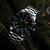 Reloj cronógrafo para hombre con correa de acero inoxidable, esfera negra e índices luminosos