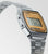 Casio Vintage - Reloj digital con correa de metal plateada, pantalla LCD naranja