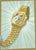 Reloj Casio Vintage dorado con correa de metal y pantalla digital de perfil