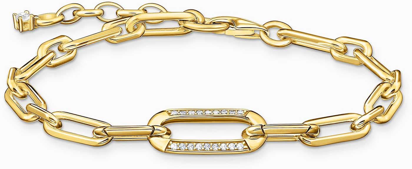 Pulsera de eslabones en tono dorado con elemento de ancla adornado con piedras y cierre de mosquetón