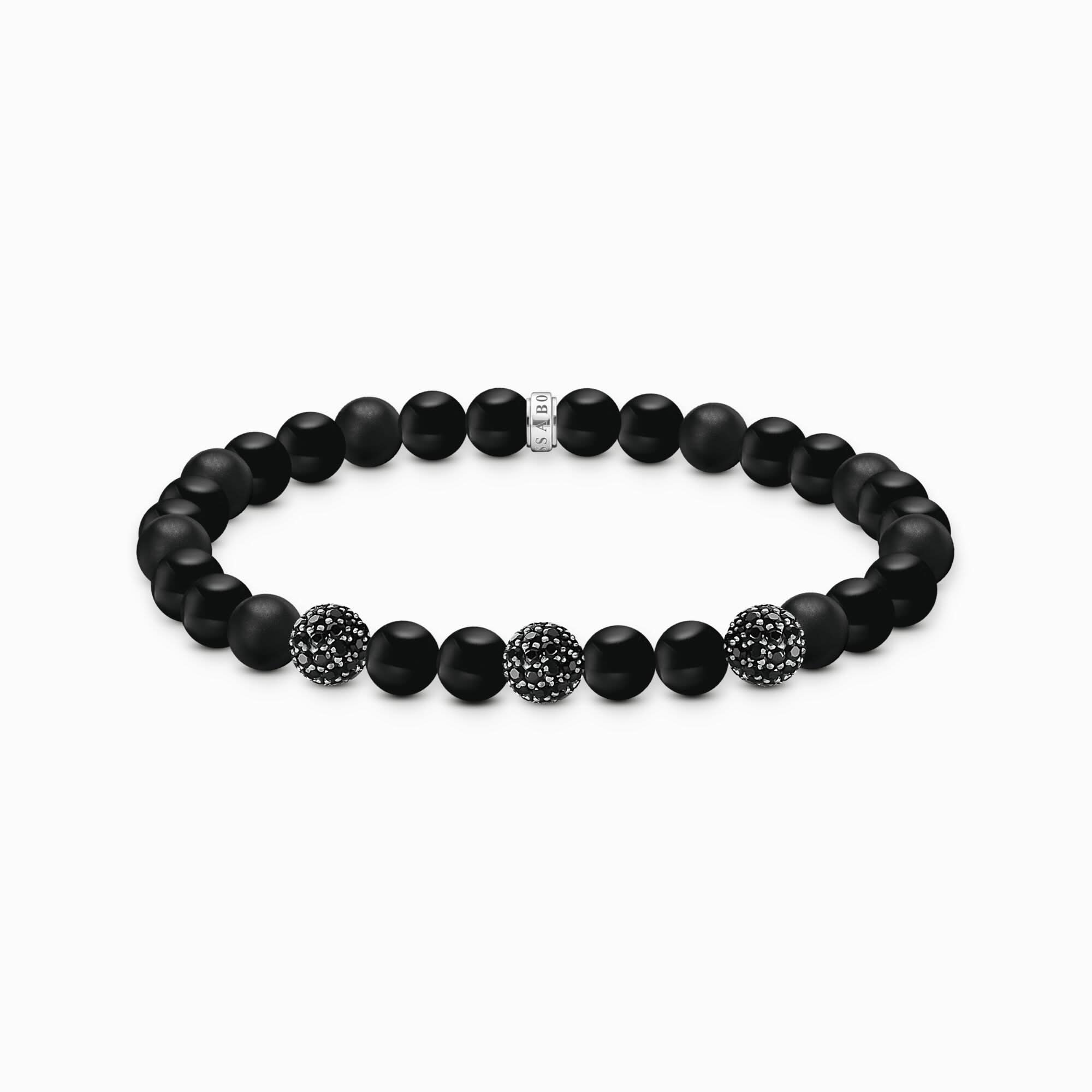 Pulsera de perlas de obsidiana con detalle de brillo negro y elementos redondos de circonita cúbica