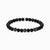 Pulsera de perlas de obsidiana con detalle de brillo negro y elementos redondos de circonita cúbica