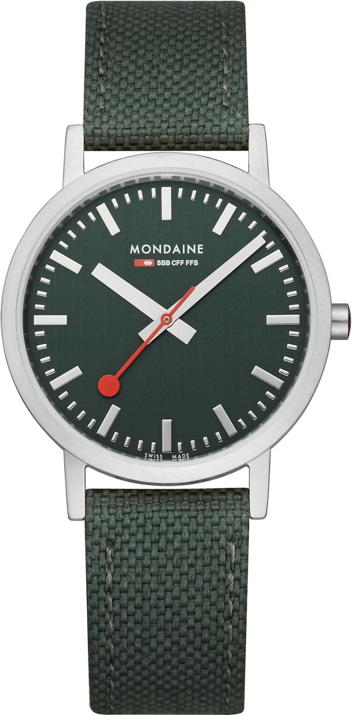Reloj unisex con esfera verde oscuro, caja plateada y correa textil verde.