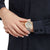 Reloj Mondaine unisex en la muñeca: correa gris, bisel dorado, esfera gris