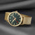 Reloj dorado para hombre con esfera verde oscuro, manecillas rojas y correa de malla