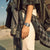 Reloj Casio en la muñeca con correa de malla metálica plateada y pantalla digital