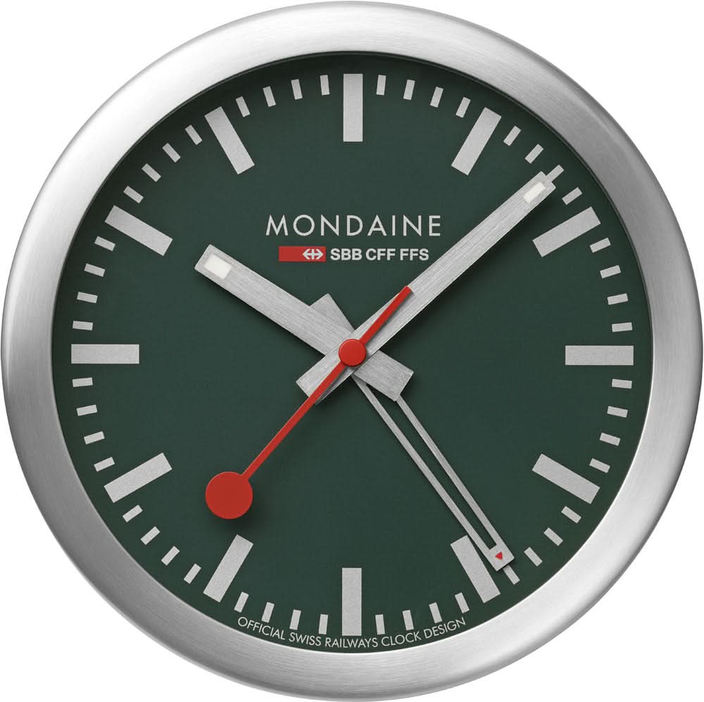 Reloj magnético Mondaine con esfera verde, caja plateada y manecillas rojas.