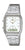 Reloj Casio Vintage con correa de metal plateada y esfera blanca, analógico y digital
