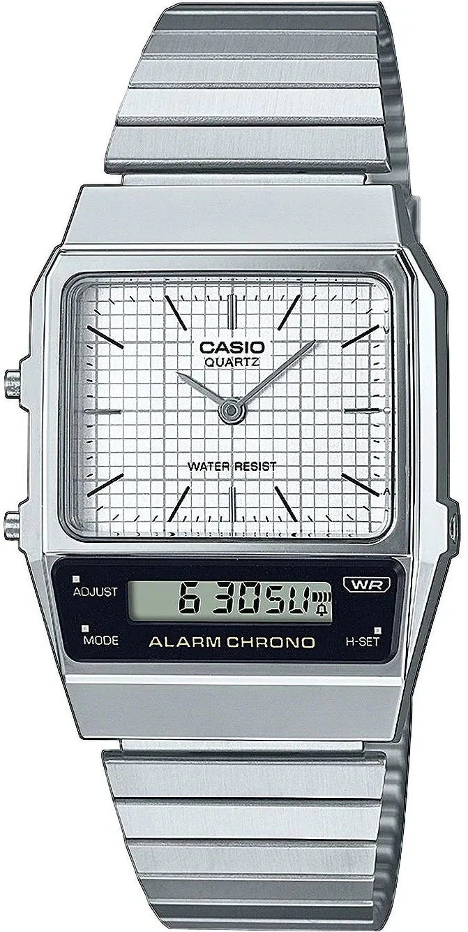 Reloj Casio Vintage con correa de metal plateada, esfera rectangular y pantalla digital