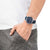 Reloj Citizen para hombre en la muñeca con esfera azul y correa de nailon