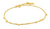 Pulsera dorada con pequeños dijes de disco y eslabones, cierre