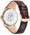Reloj de hombre con correa de cuero burdeos y fondo de caja visible con grabado