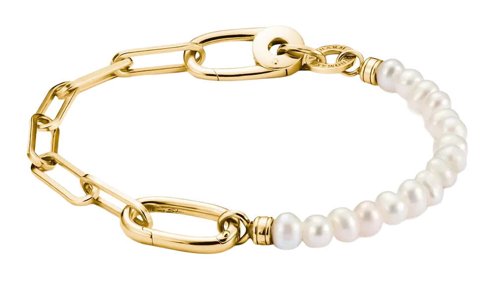 Pulsera de eslabones en tono dorado con perlas blancas y eslabón de conexión, colgante en forma de corazón
