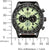 Reloj de hombre visto de frente con esfera verde, caja negra y correa de cuero