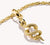Colgante de serpiente en plata dorada con gema blanca, con ojal y cadena