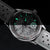 Reloj DS9 de Holzkern con marcadores verde luminoso, esfera gris veteada, correa de cuero gris claro