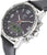 Pulsera de hombre, vista lateral: esfera negra, caja de acero inoxidable, pulsadores
