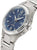 "Reloj de mujer con esfera azul, bisel estriado y corona/pulsador en la caja"