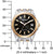 "Reloj de mujer con esfera negra y bisel dorado, junto a una escala de medición."