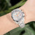 Reloj Festina para mujer en la muñeca, correa de acero inoxidable y bisel de cristal