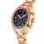 "Reloj de mujer con caja de oro rosa, bisel de piedra de colores y esfera negra"