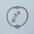 Pulsera de eslabones de acero inoxidable con cierre de oro rosa y piezas de abalorios individuales